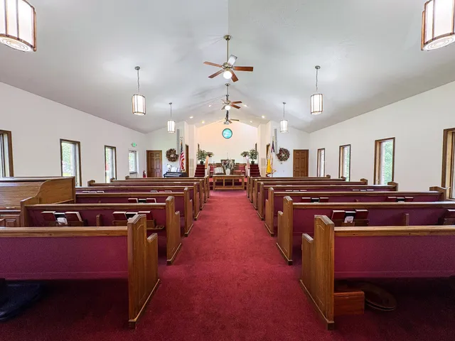 a kitchen with stove and cabinets