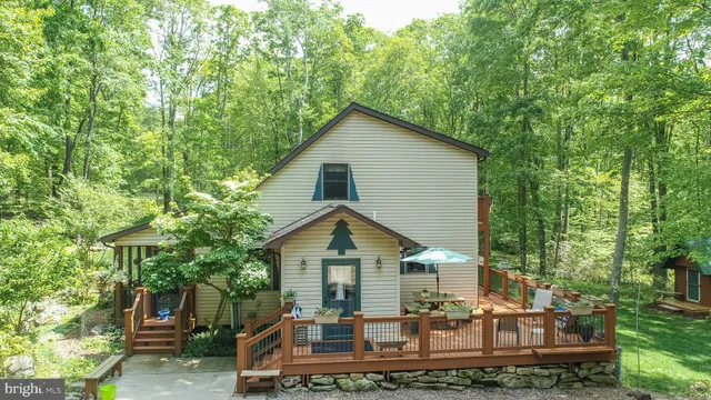 a view of a backyard of the house