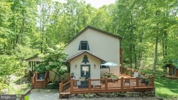 a view of a backyard of the house
