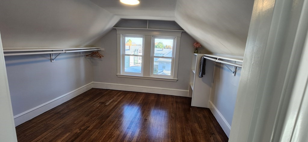 38 Kimball Road, Unit 2 Watertown, MA 02472 - Photo 18 of 29 a view of a room with wooden floors and window
