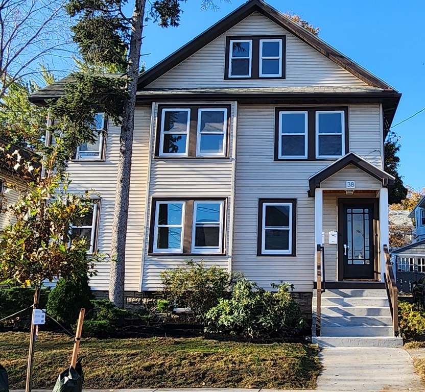 38 Kimball Road, Unit 2 Watertown, MA 02472 - Photo 21 of 29 a front view of a house with a yard