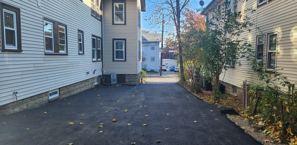 38 Kimball Road, Unit 2 Watertown, MA 02472 - Photo 23 of 29 a view of a house with a yard