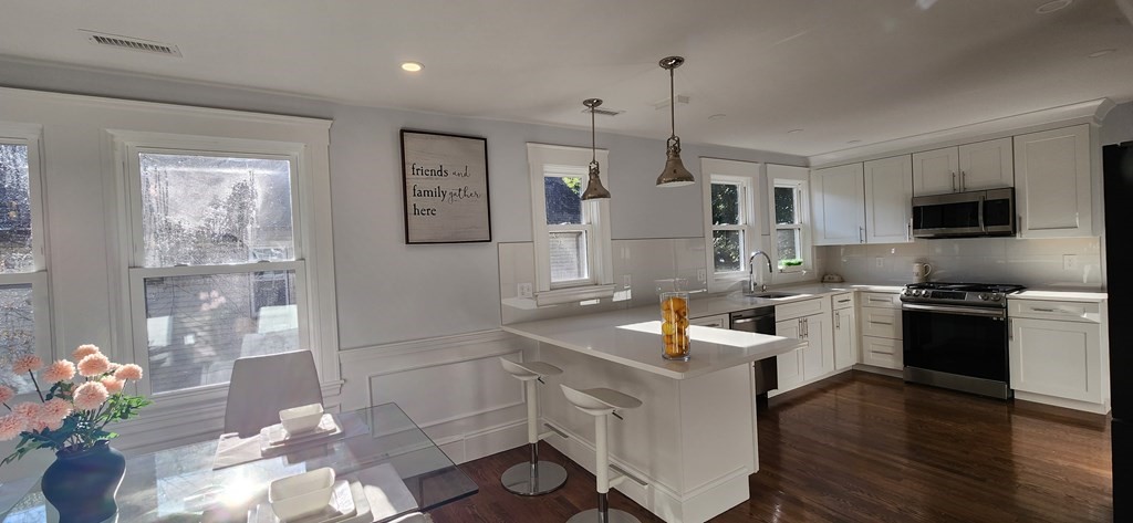 38 Kimball Road, Unit 2 Watertown, MA 02472 - Photo 5 of 29 a kitchen with a sink stove and refrigerator