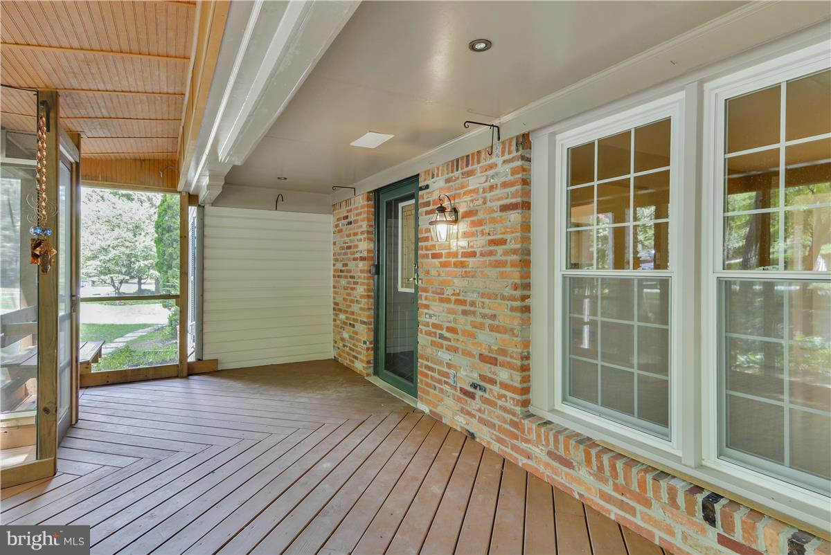 15212 Philip Lee Road Chantilly, VA 20151 - Photo 3 of 30 a view of outdoor space with wooden floor and windows