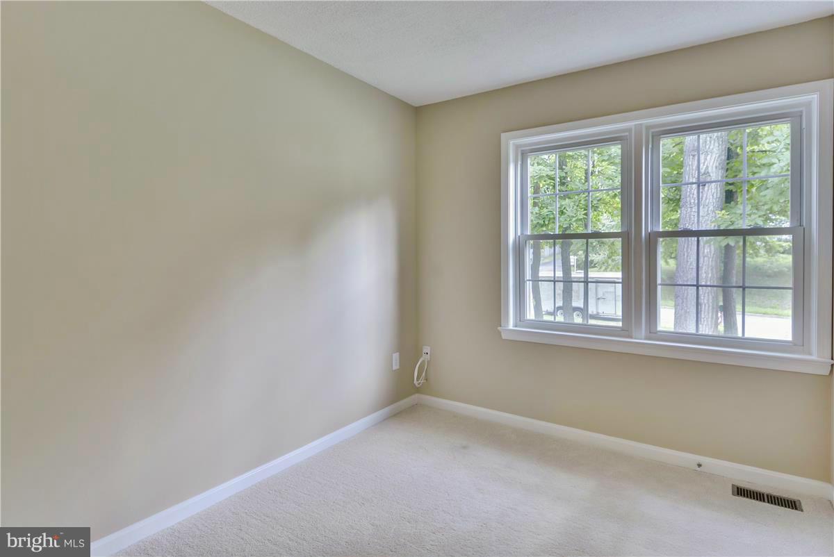 15212 Philip Lee Road Chantilly, VA 20151 - Photo 23 of 30 an empty room with a window