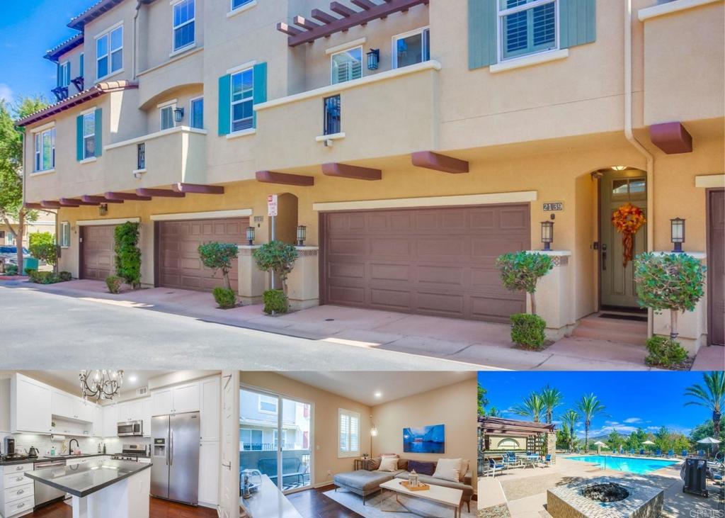 a view of building with cars parked