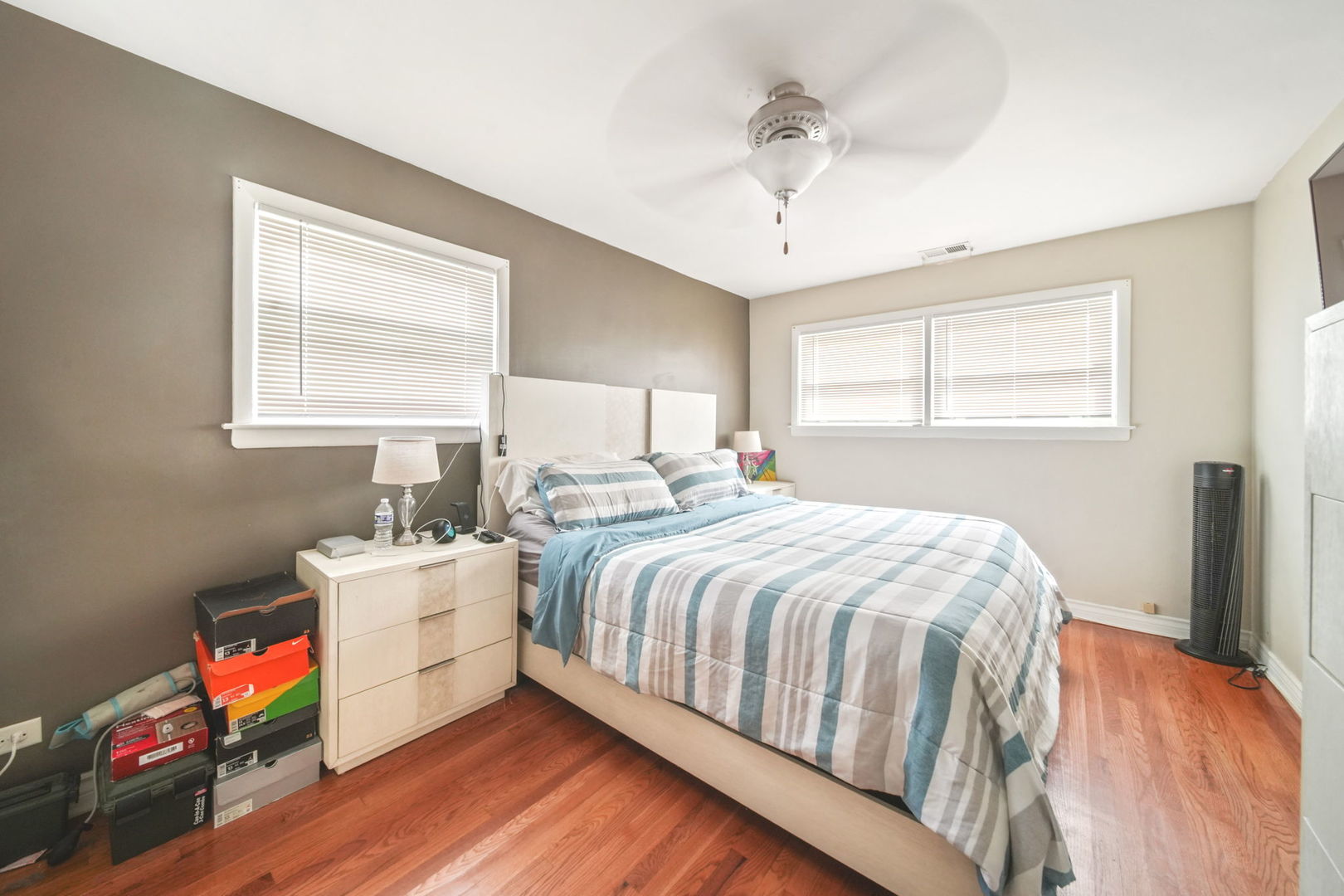7235 Park Avenue Summit, IL 60501 - Photo 15 of 30 a bedroom with a bed and a wooden floor