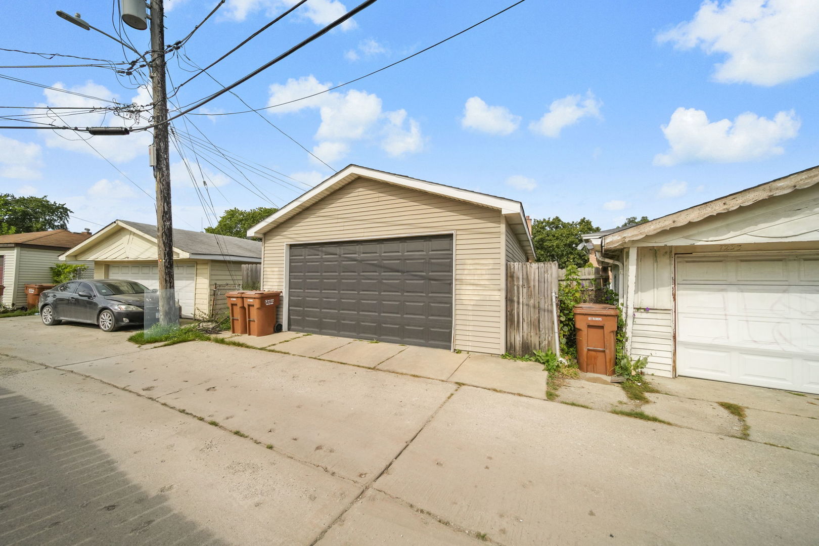 7235 Park Avenue Summit, IL 60501 - Photo 29 of 30 a front view of a house with a yard and garage