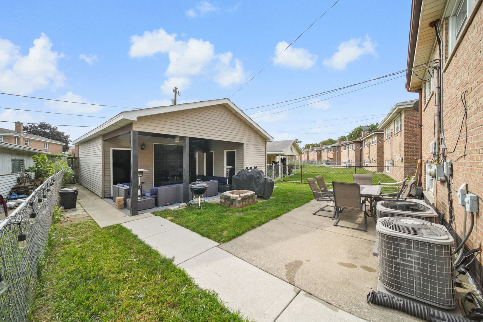 7235 Park Avenue Summit, IL 60501 - Photo 30 of 30 a view of a house with backyard sitting area and garden