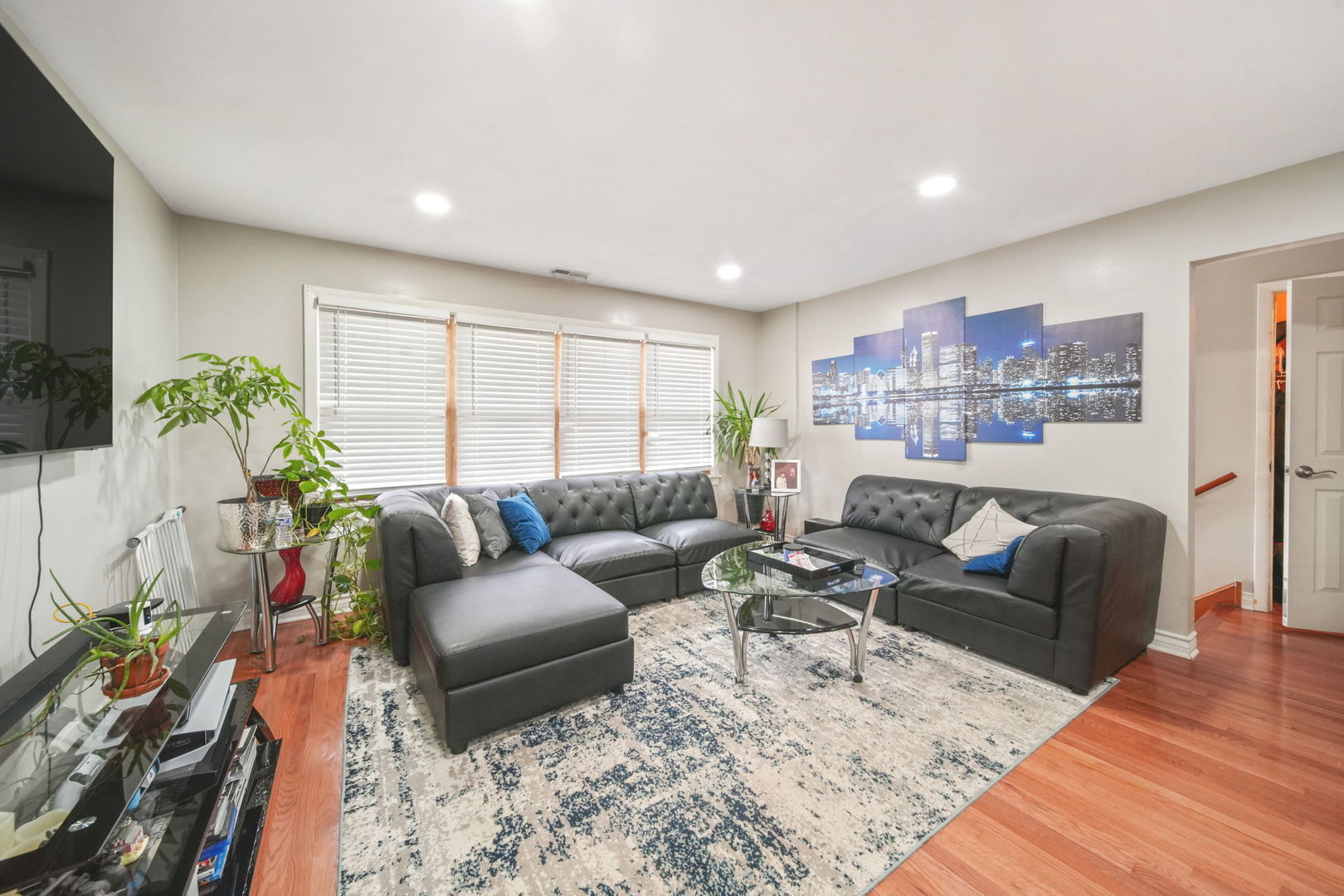 7235 Park Avenue Summit, IL 60501 - Photo 7 of 30 a living room with furniture and a flat screen tv