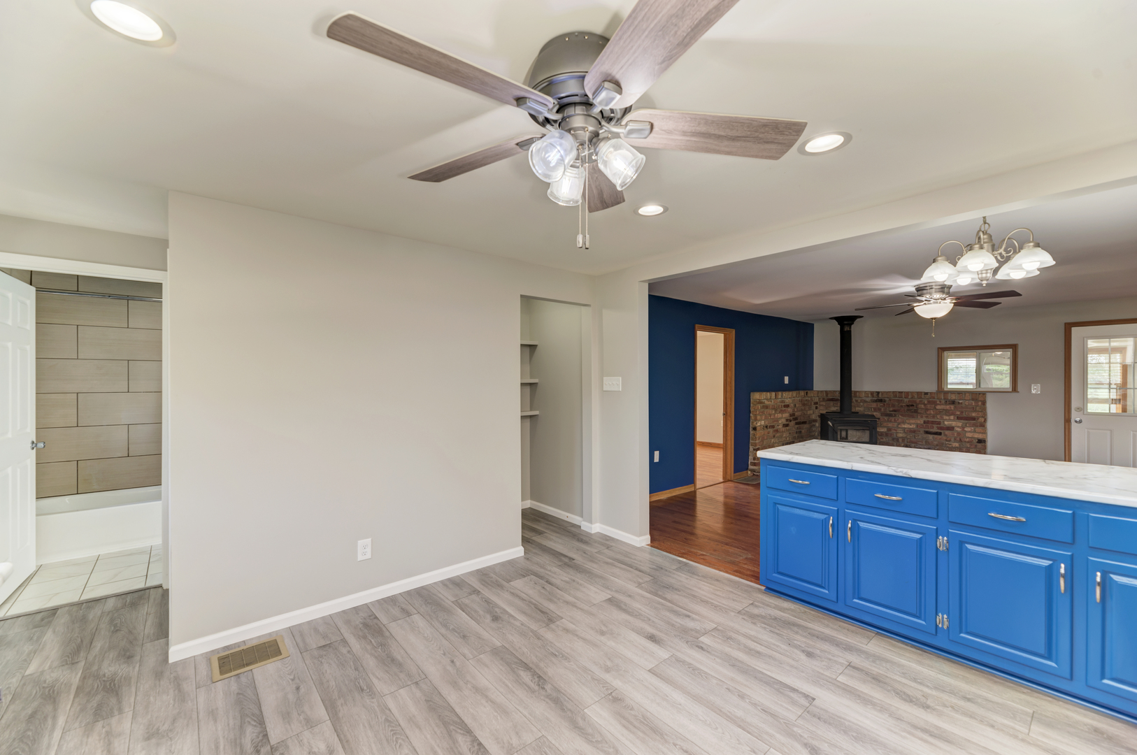 17357 Sedgewick Road Plano, IL 60545 - Photo 13 of 36 a view of a kitchen counter space a sink and wooden floor