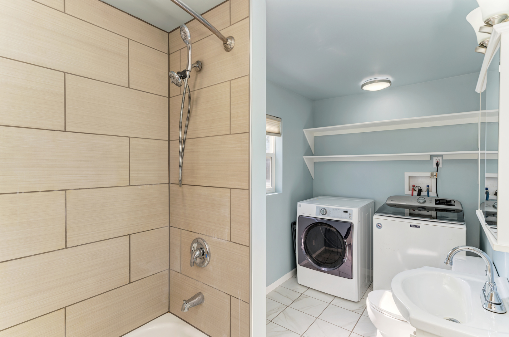 17357 Sedgewick Road Plano, IL 60545 - Photo 15 of 36 a bathroom with a sink toilet and shower