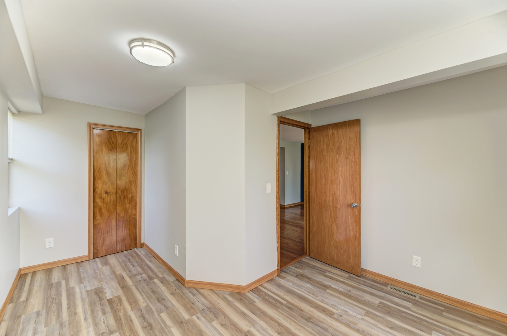 17357 Sedgewick Road Plano, IL 60545 - Photo 20 of 36 a view of an empty room and wooden floor