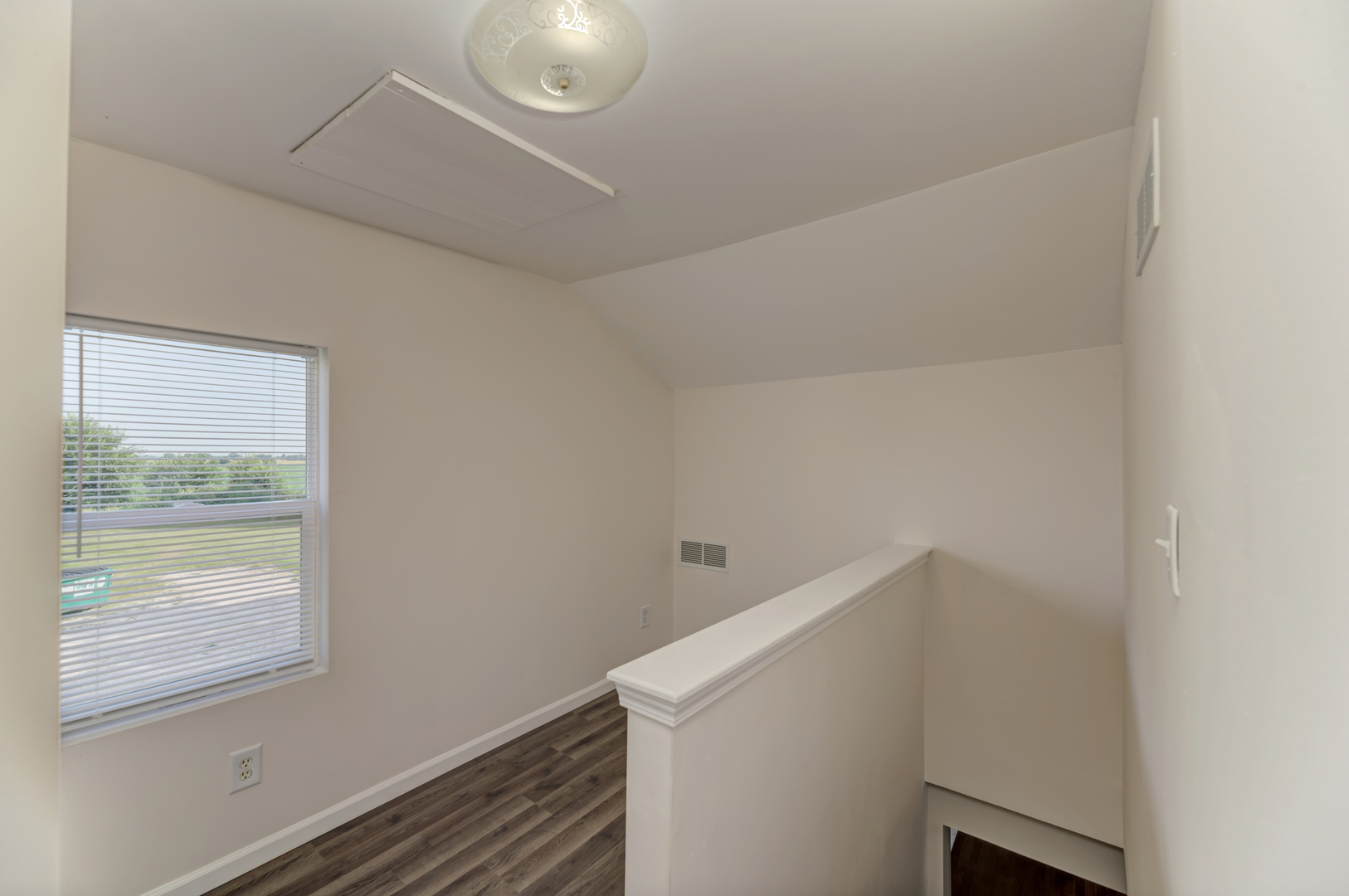 17357 Sedgewick Road Plano, IL 60545 - Photo 22 of 36 a utility room with a window and a fan