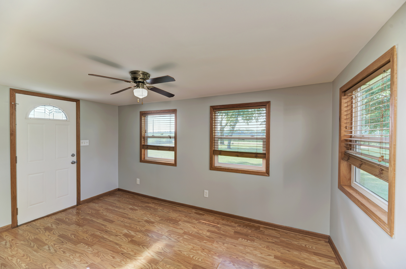 17357 Sedgewick Road Plano, IL 60545 - Photo 5 of 36 a view of an empty room with a window
