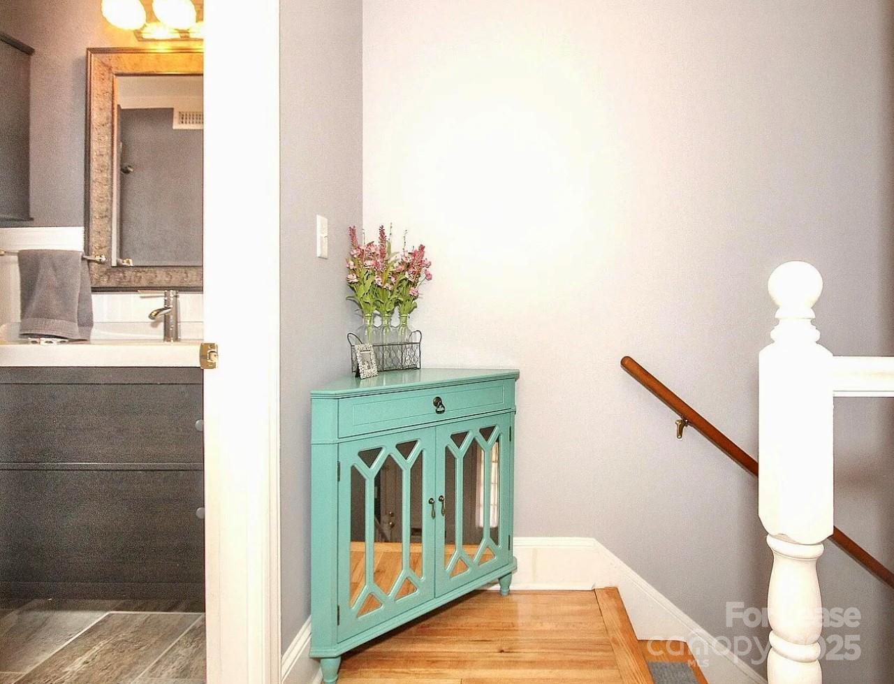 858 McAlway Road, Unit A Charlotte, NC 28211 - Photo 14 of 20 a bathroom with a sink and a mirror