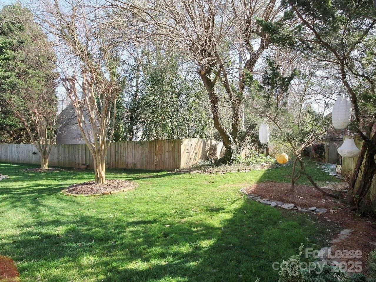 858 McAlway Road, Unit A Charlotte, NC 28211 - Photo 3 of 20 a garden with lots of trees
