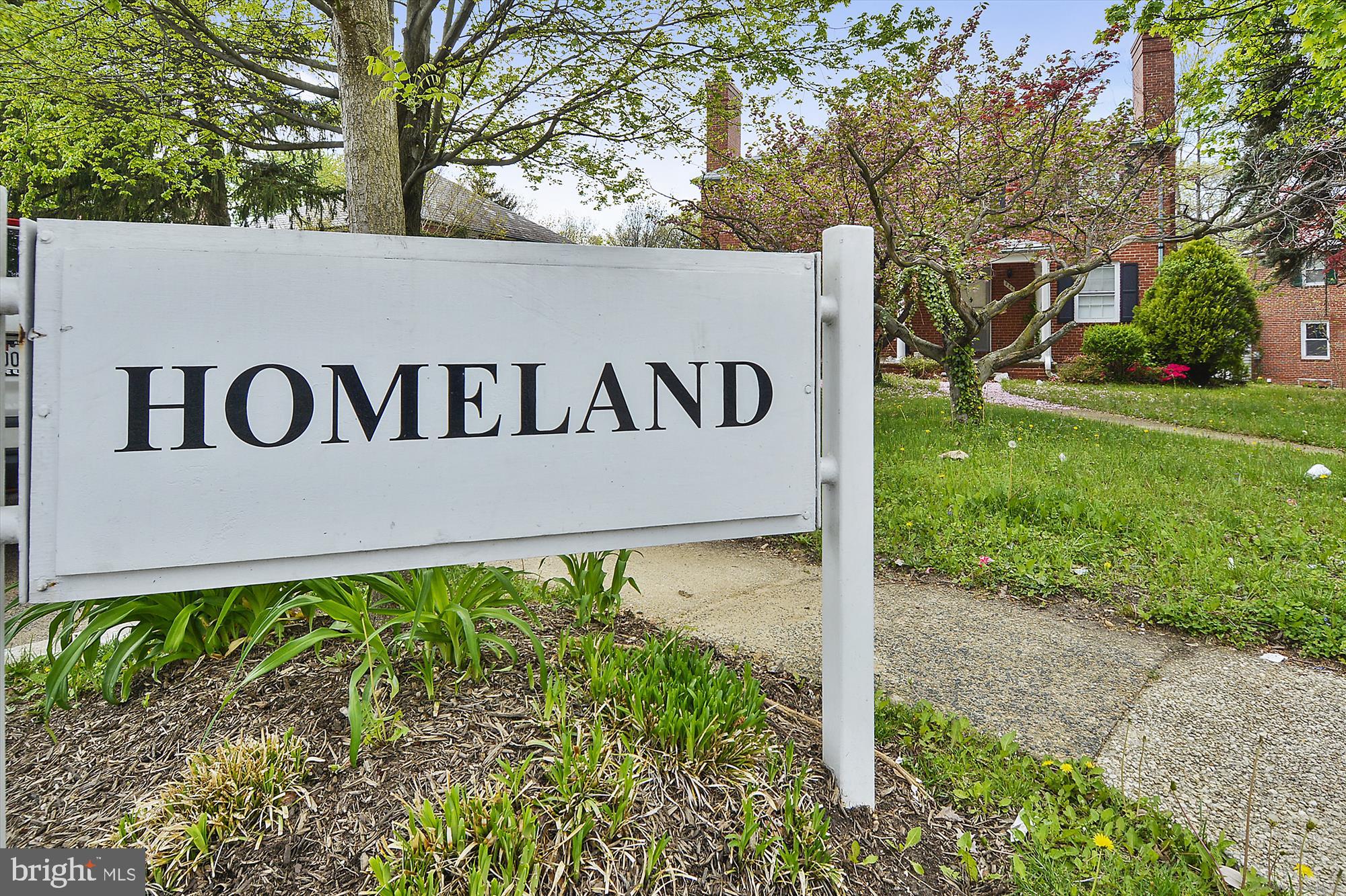 5209 Springlake Way Baltimore, MD 21212 - Photo 54 of 57 a sign broad on the side of the road