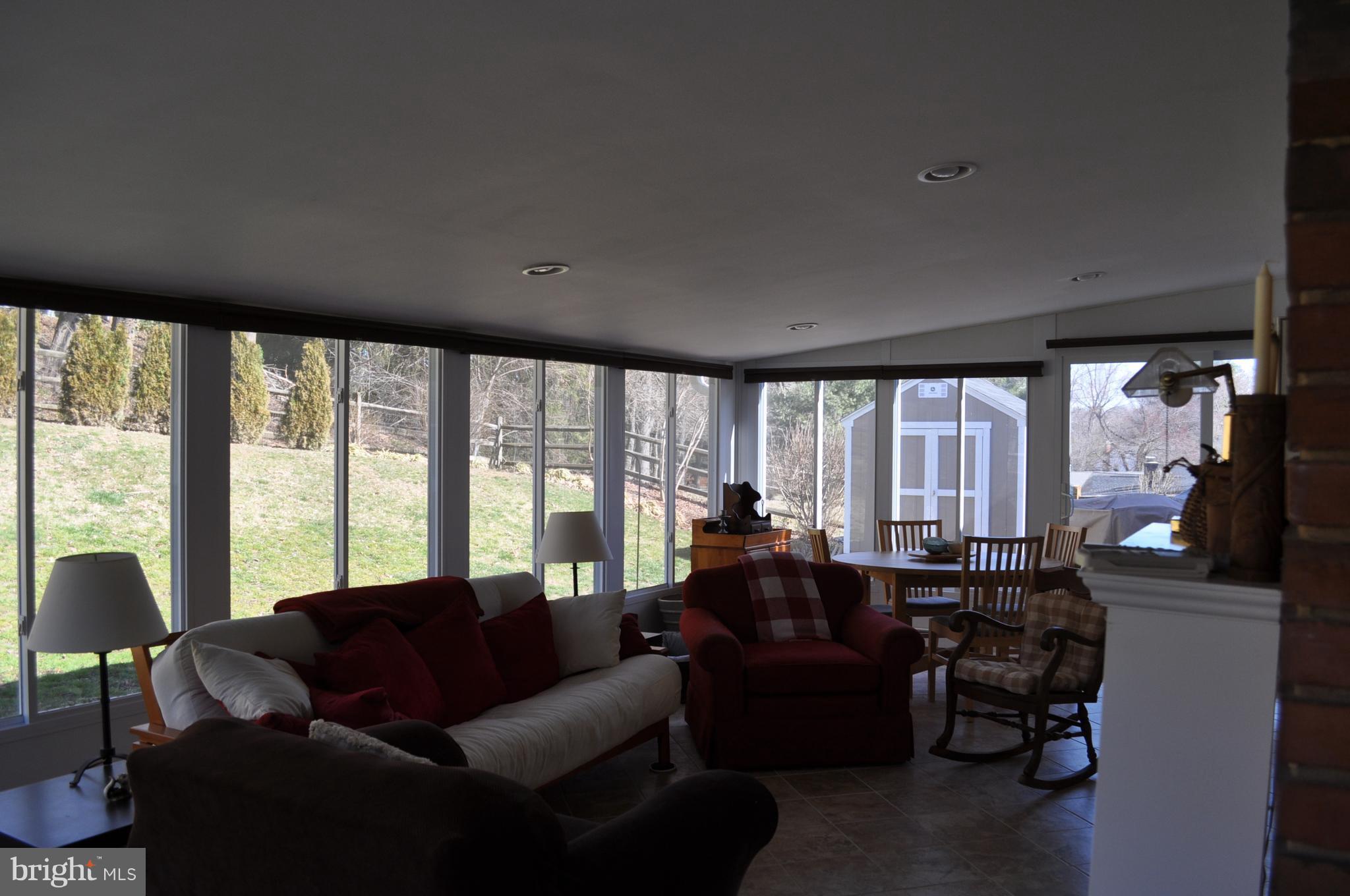 5159 Downwest Ride Columbia, MD 21044 - Photo 12 of 23 a living room with furniture and a large window