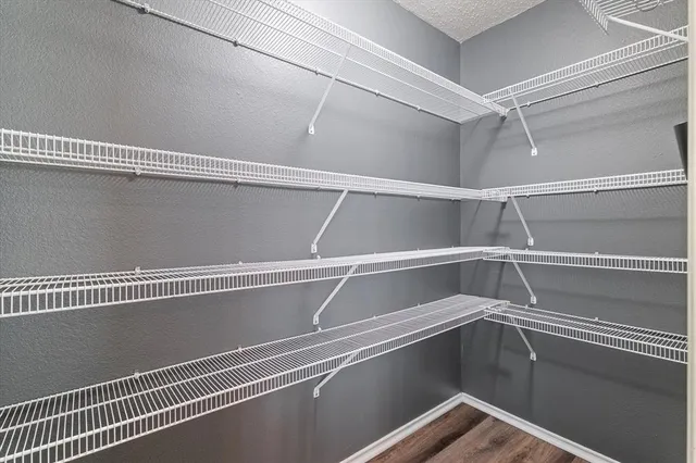 a view of a room with racks on the wall