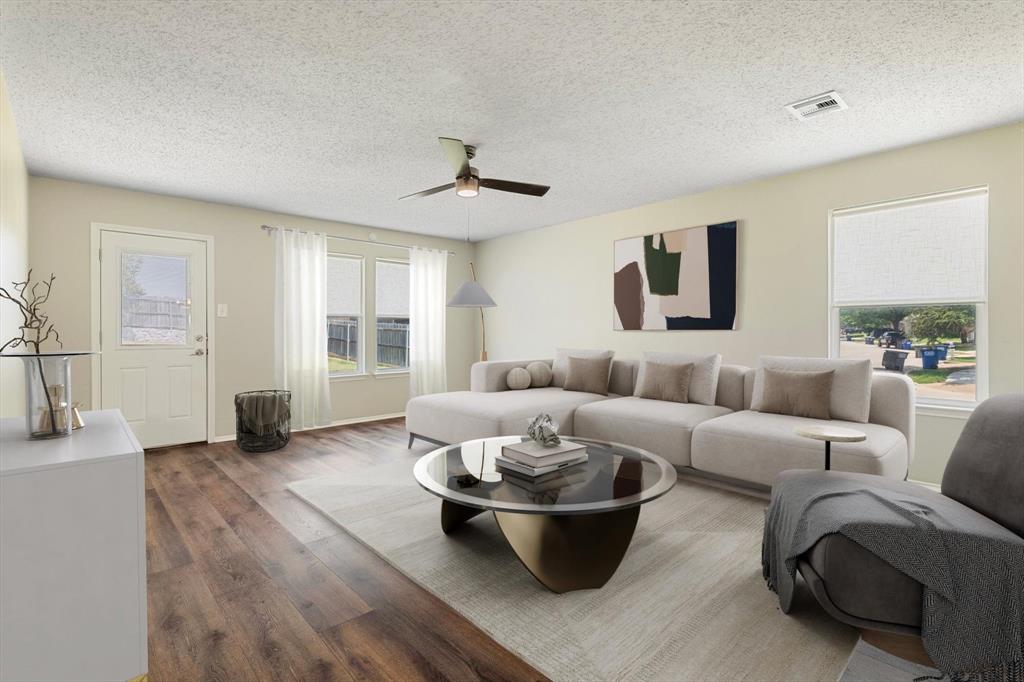 1448 Ridgecrest Drive Little Elm, TX 75068 - Photo 16 of 29 a living room with furniture and a large window