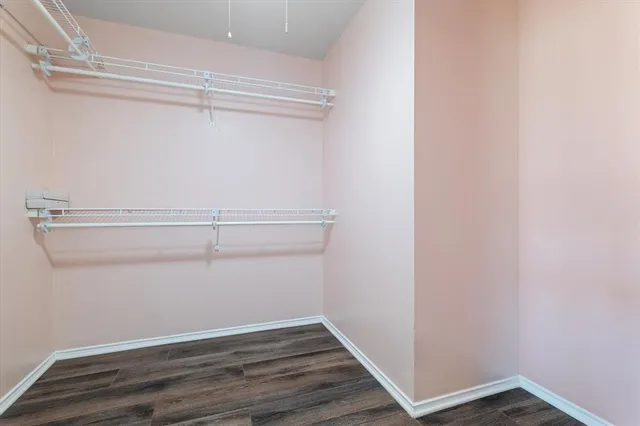 a view of an empty walk in closet