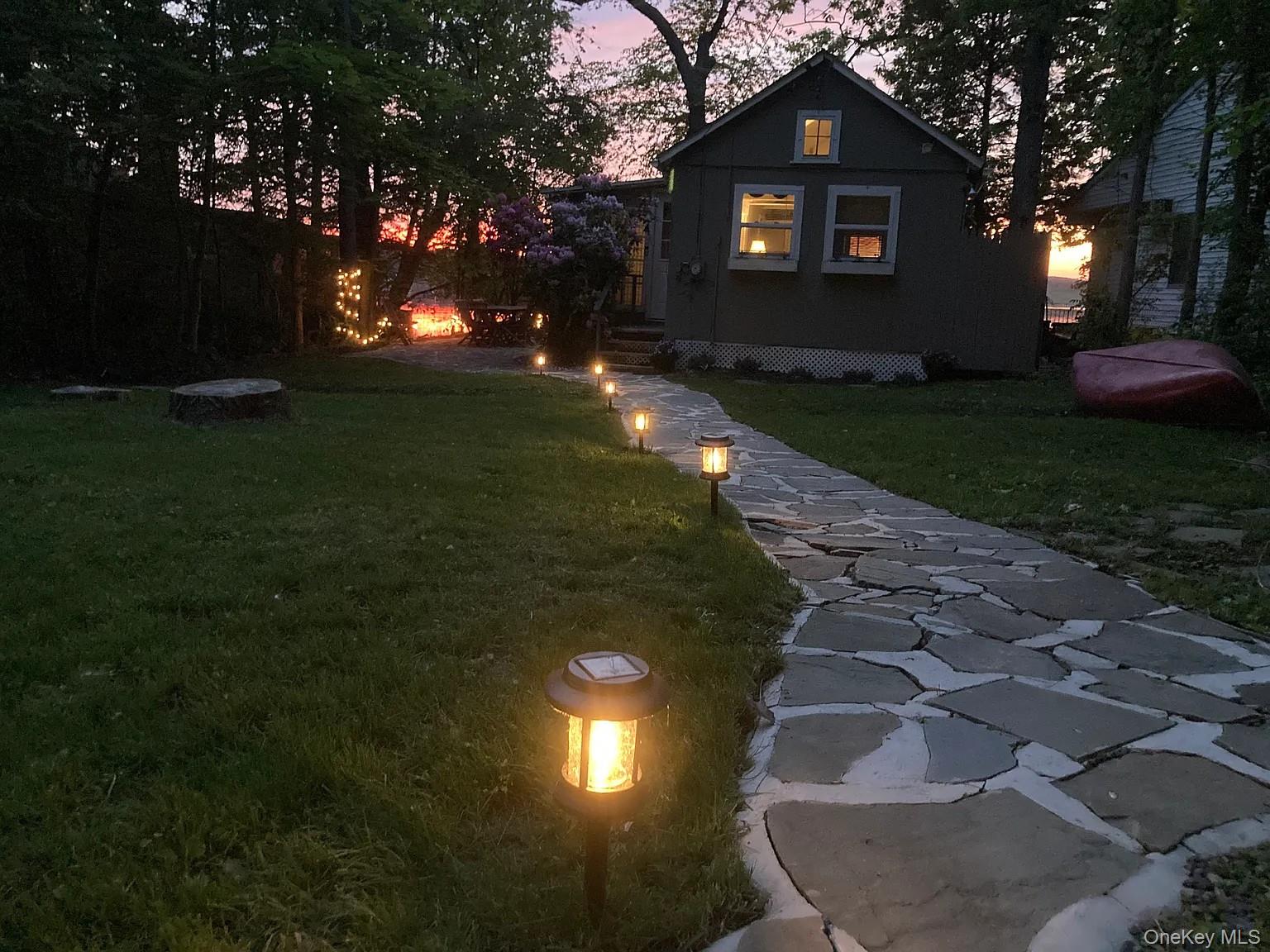 206 Sunset Cove Road Newburgh, NY 12550 - Photo 4 of 23 a front view of a house with a yard