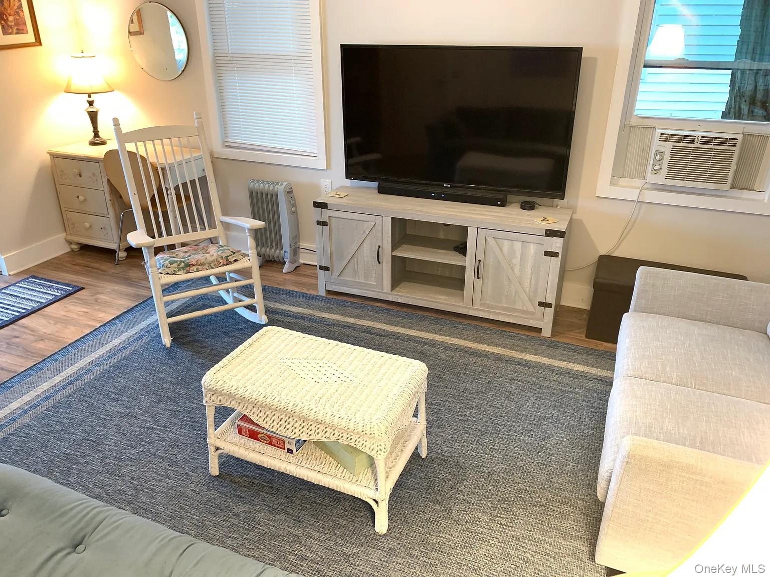 206 Sunset Cove Road Newburgh, NY 12550 - Photo 5 of 23 a living room with furniture and a flat screen tv