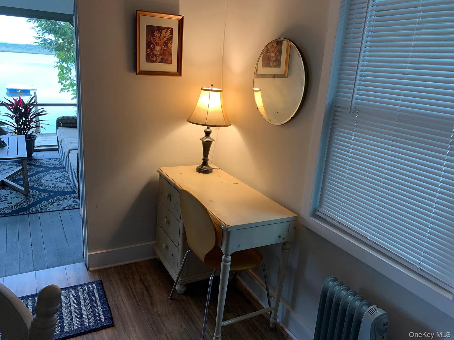 206 Sunset Cove Road Newburgh, NY 12550 - Photo 7 of 23 a bathroom with a toilet and a mirror