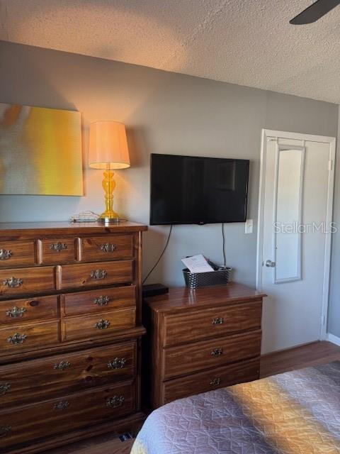 4746 Azalea Drive, Unit 103C New Port Richey, FL 34652 - Photo 15 of 35 a room with a dresser in it