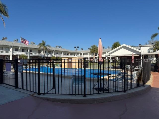 4746 Azalea Drive, Unit 103C New Port Richey, FL 34652 - Photo 25 of 35 a view of a balcony with city view