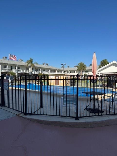 4746 Azalea Drive, Unit 103C New Port Richey, FL 34652 - Photo 26 of 35 a view of a balcony with an ocean view