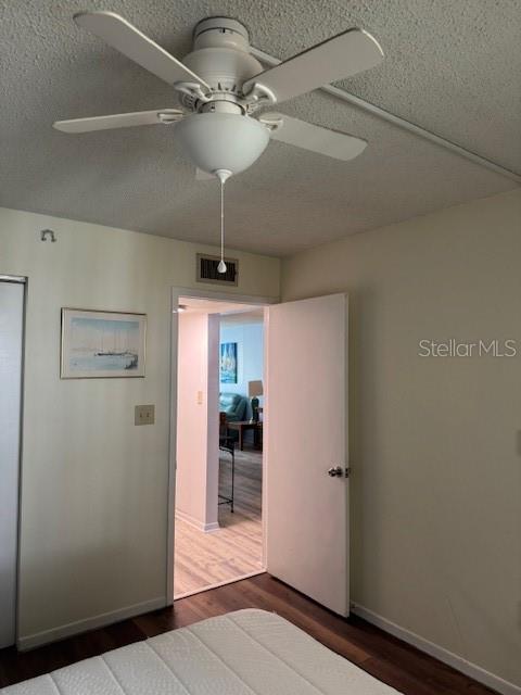 4746 Azalea Drive, Unit 103C New Port Richey, FL 34652 - Photo 33 of 68 a view of a hallway with wooden shelves
