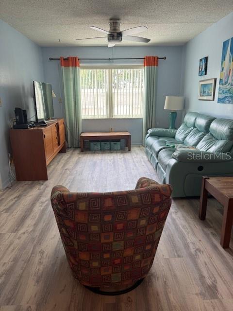 4746 Azalea Drive, Unit 103C New Port Richey, FL 34652 - Photo 4 of 68 a living room with furniture and a window