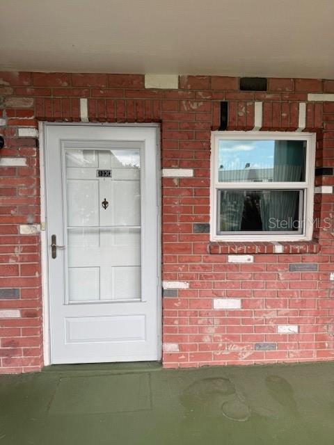 4746 Azalea Drive, Unit 103C New Port Richey, FL 34652 - Photo 68 of 68 a view of front door of house