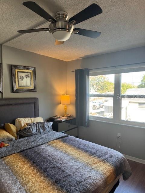 4746 Azalea Drive, Unit 103C New Port Richey, FL 34652 - Photo 7 of 35 a bedroom with a bed and window