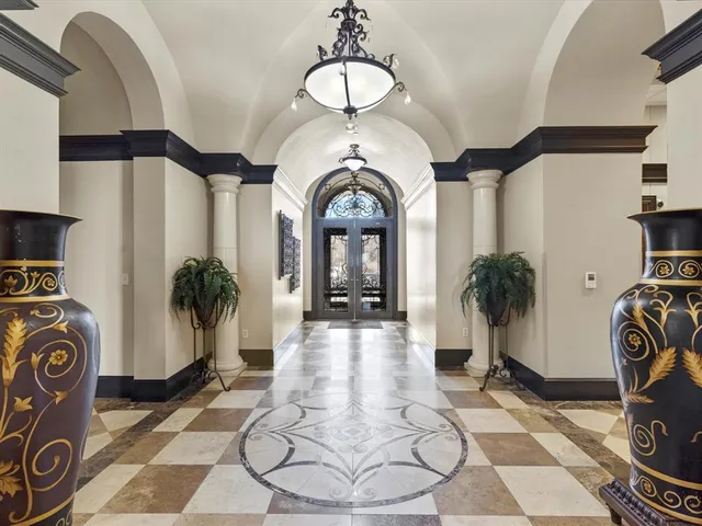 a view of a swimming pool with a lounge chairs