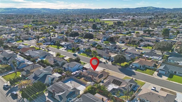 an aerial view of city and mountain view