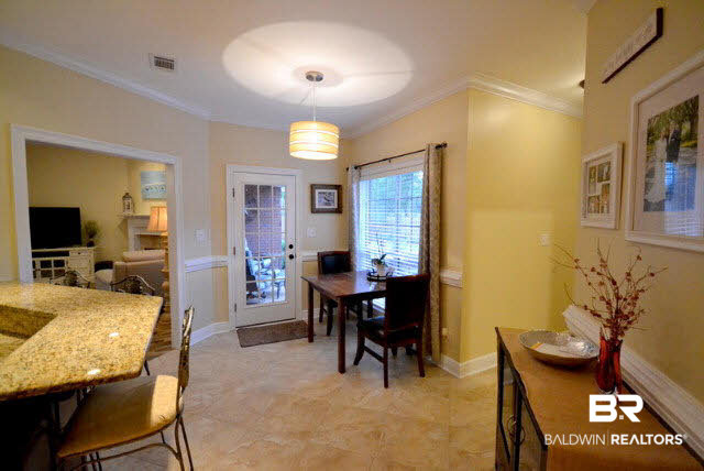 1640 Augusta Drive West Mobile, AL 36695 - Photo 9 of 25 Breakfast nook overlooking beautifully fenced backyard, covered porch and patio.