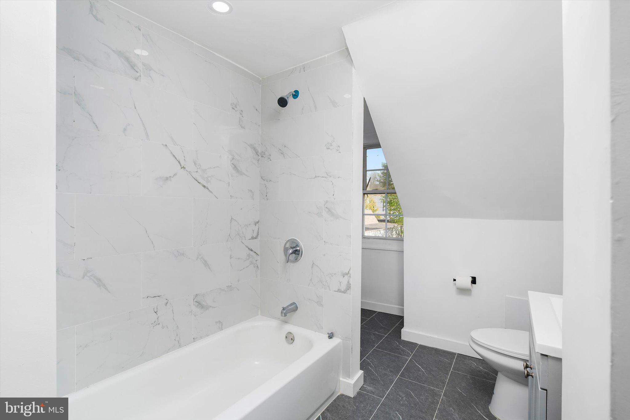 10 Lytle Street, Unit 5 Princeton, NJ 08542 - Photo 15 of 20 a bathroom with a bathtub and toilet