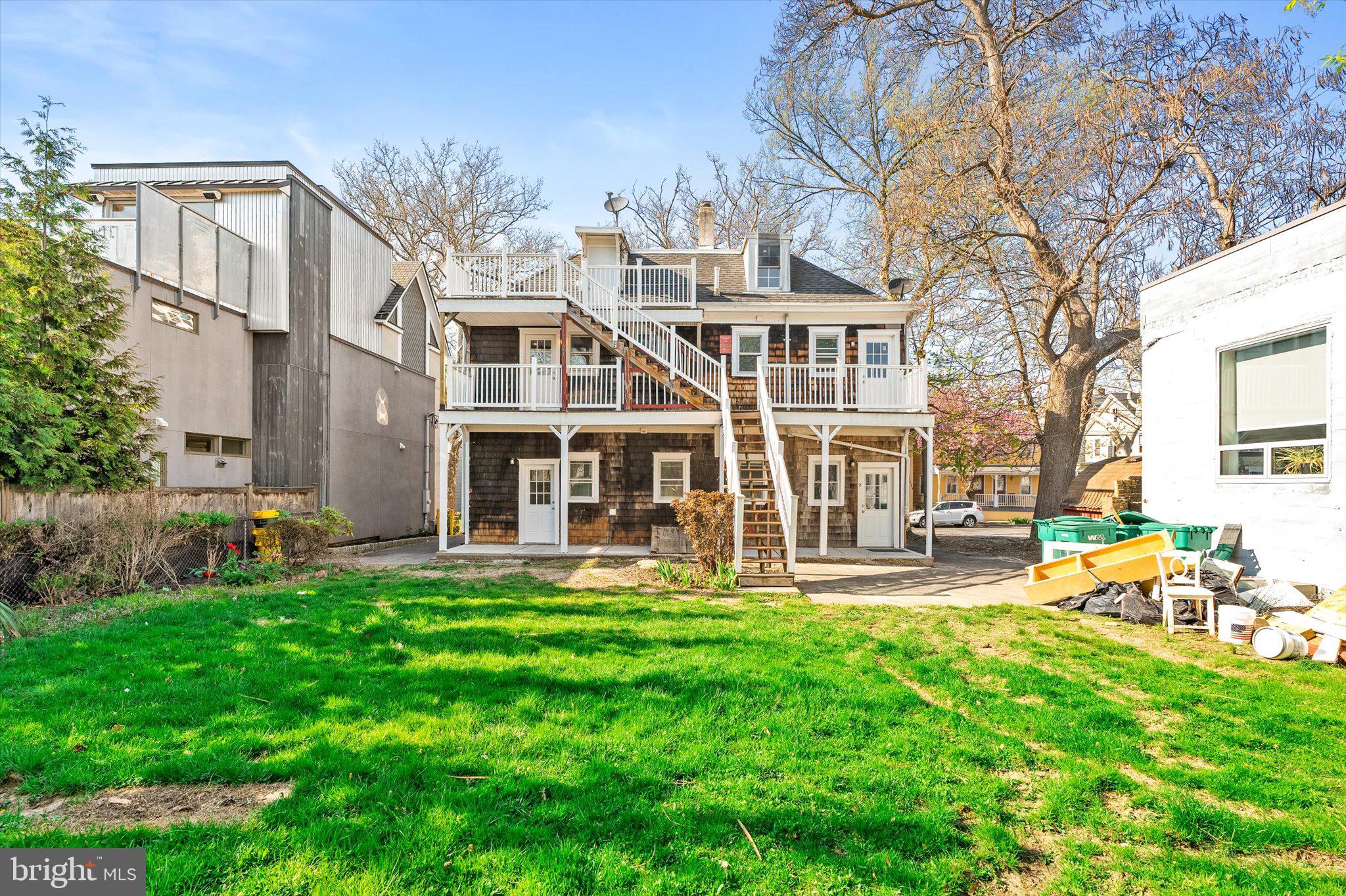 10 Lytle Street, Unit 5 Princeton, NJ 08542 - Photo 20 of 20 a front view of a building with a garden and trees
