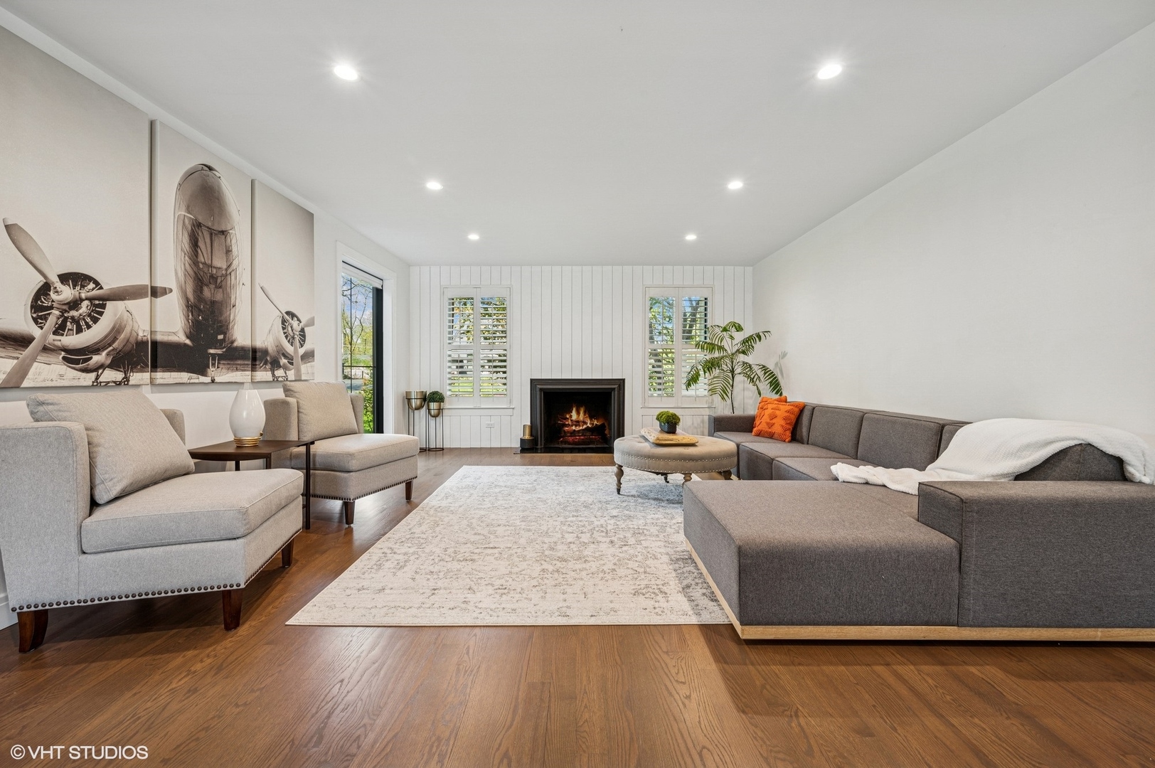 1933 Ridgewood Lane West Glenview, IL 60025 - Photo 13 of 42 a living room with furniture and a fireplace