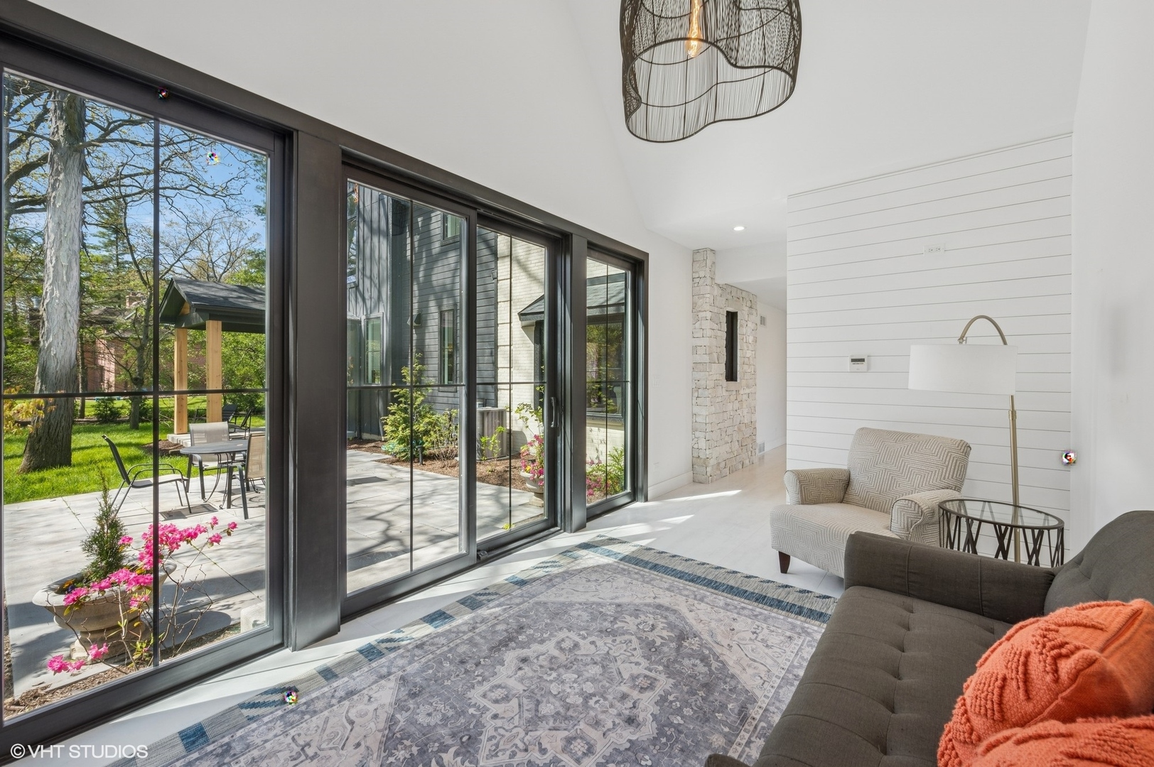 1933 Ridgewood Lane West Glenview, IL 60025 - Photo 19 of 42 a living room with furniture and a floor to ceiling window