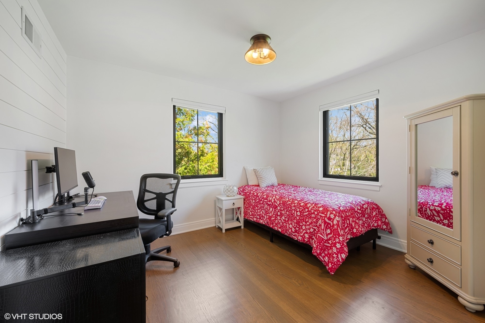 1933 Ridgewood Lane West Glenview, IL 60025 - Photo 23 of 42 a bedroom with a bed and a desk