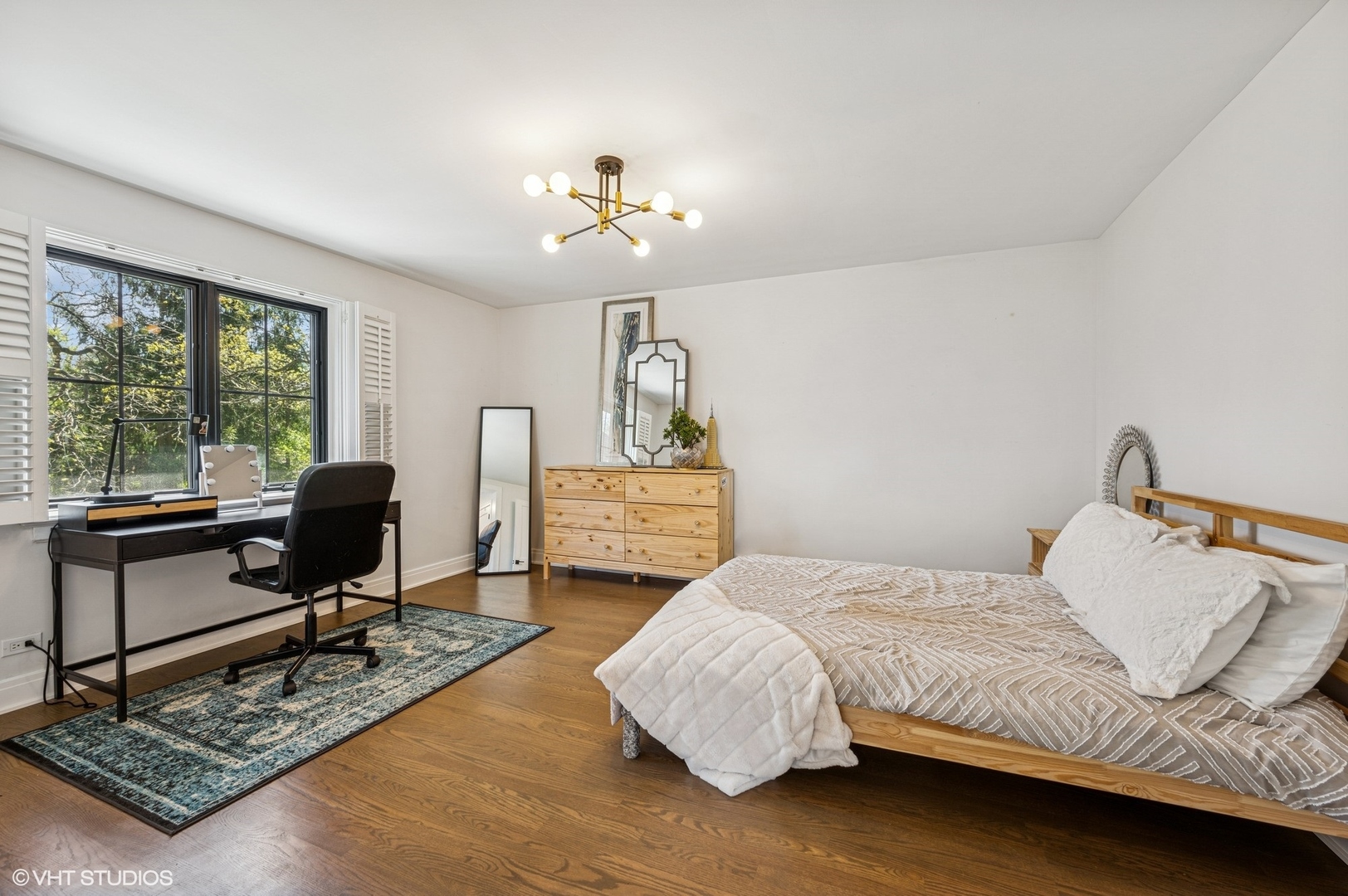 1933 Ridgewood Lane West Glenview, IL 60025 - Photo 27 of 42 a bedroom with a bed window and couch