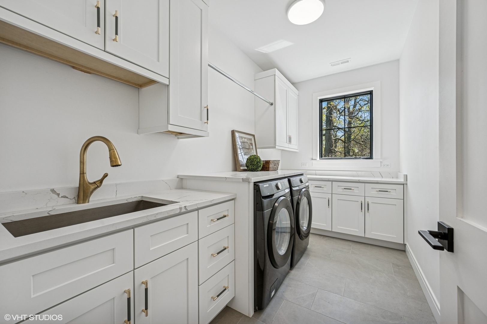 1933 Ridgewood Lane West Glenview, IL 60025 - Photo 31 of 42 a utility room with sink dryer and washer
