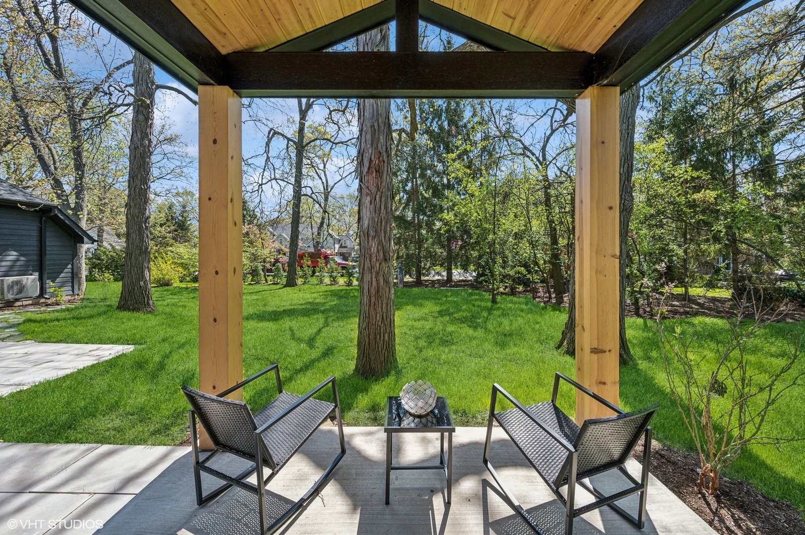 1933 Ridgewood Lane West Glenview, IL 60025 - Photo 37 of 42 a view of chairs and table in backyard of the house