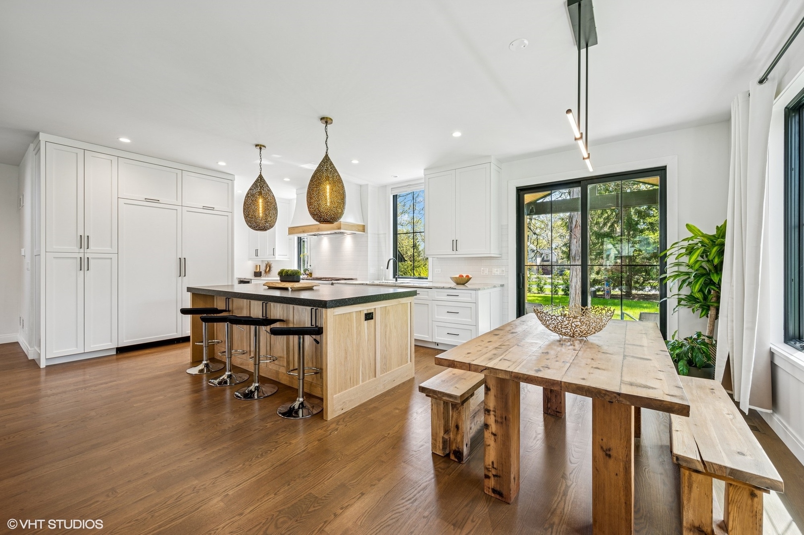 1933 Ridgewood Lane West Glenview, IL 60025 - Photo 7 of 42 a view of a dining room with furniture window and wooden floor