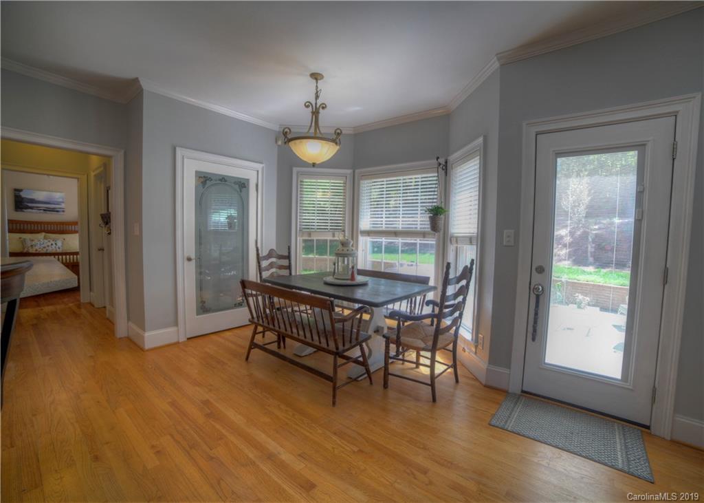 929 Ashford Way, Unit 79 Fort Mill, SC 29708 - Photo 11 of 39 a view of a livingroom with furniture window and wooden floor