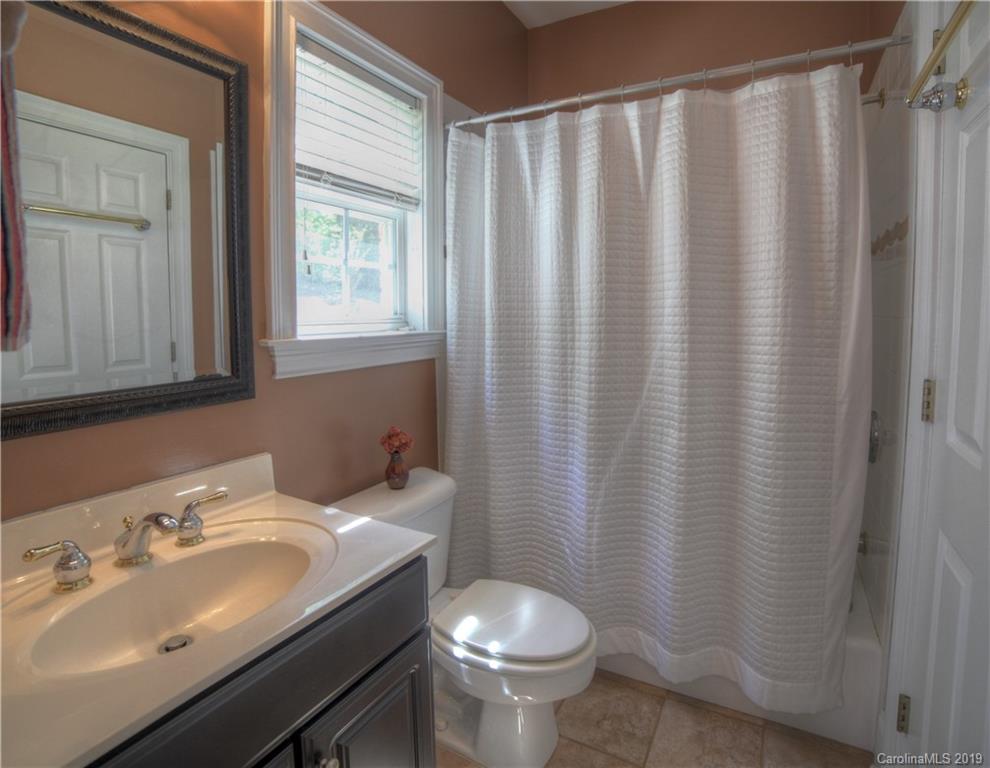 929 Ashford Way, Unit 79 Fort Mill, SC 29708 - Photo 16 of 39 a bathroom with a sink toilet and mirror